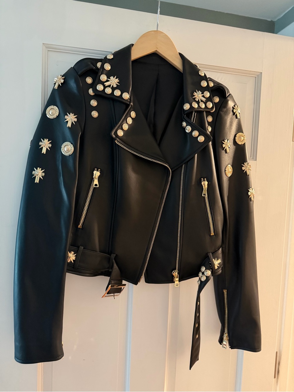 Studded Black Leather Moto Jacket with Gold Accents
